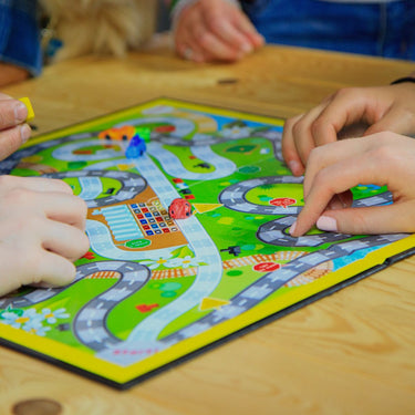 People playing a children's Board Game