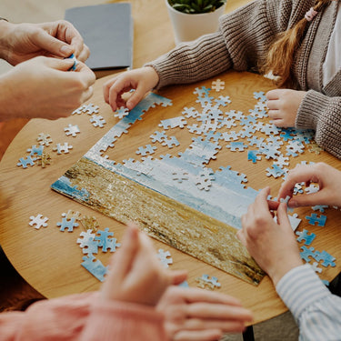 A group of people solving a puzzle.