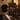 Close-up of a steampunk-style mechanical object with intricate details in a blurred background