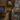 Clock and stone wall in the Seven Dwarfs escape room.